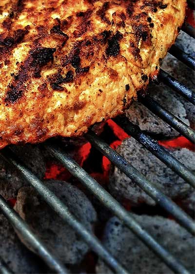 pattie on a charcoal grill